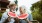 a man and a woman eating watermelon