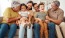 a group of people sitting on a couch